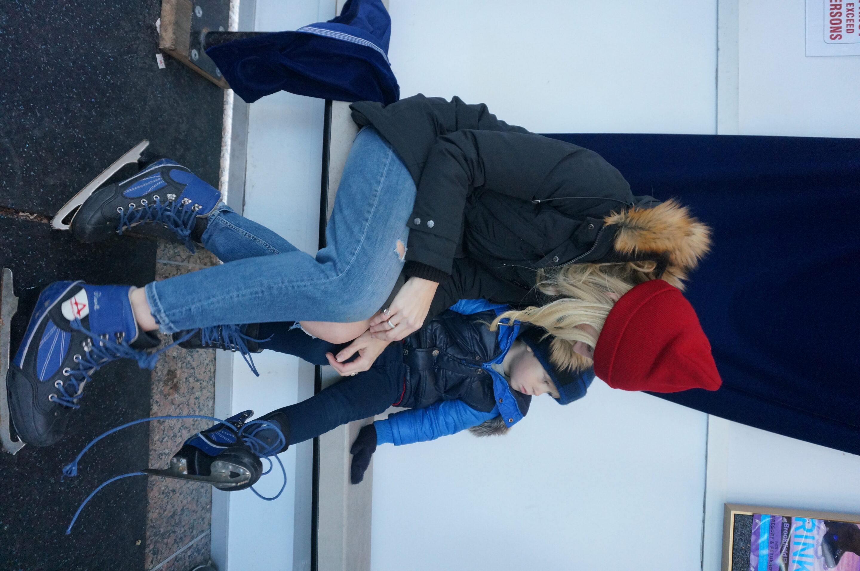 Lacing the skates at Brookfield Place Rink