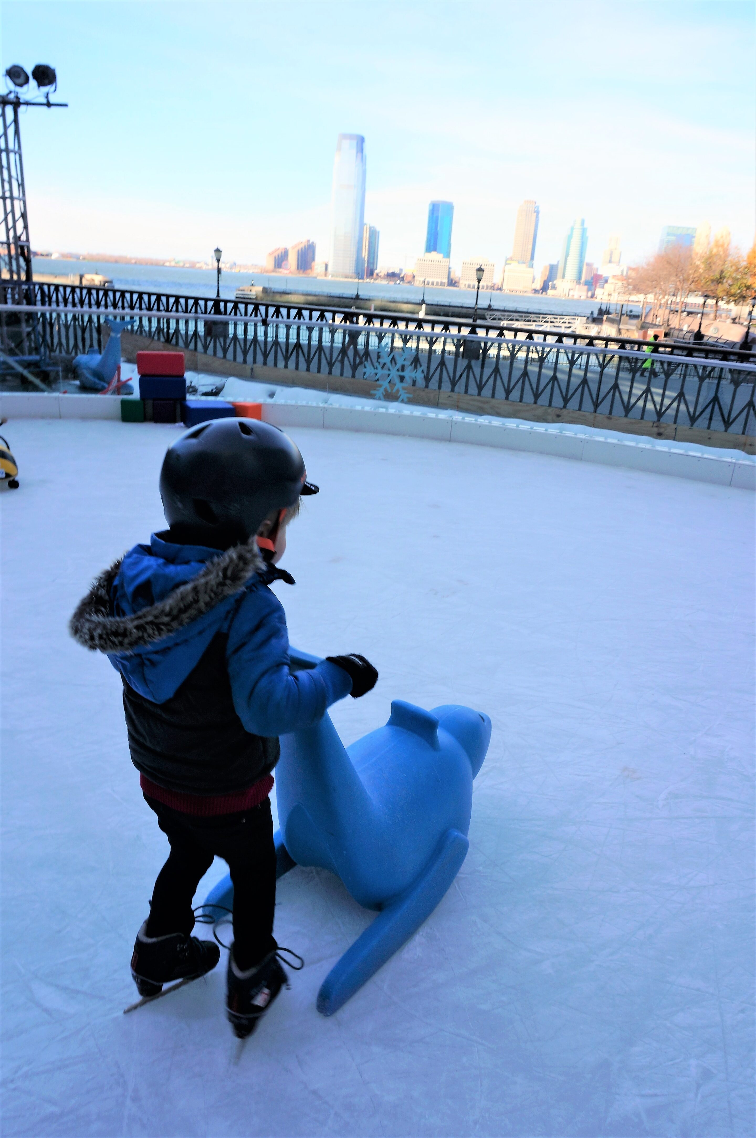 Skating lesson at the Rink at Brookfield Place overlooking the river