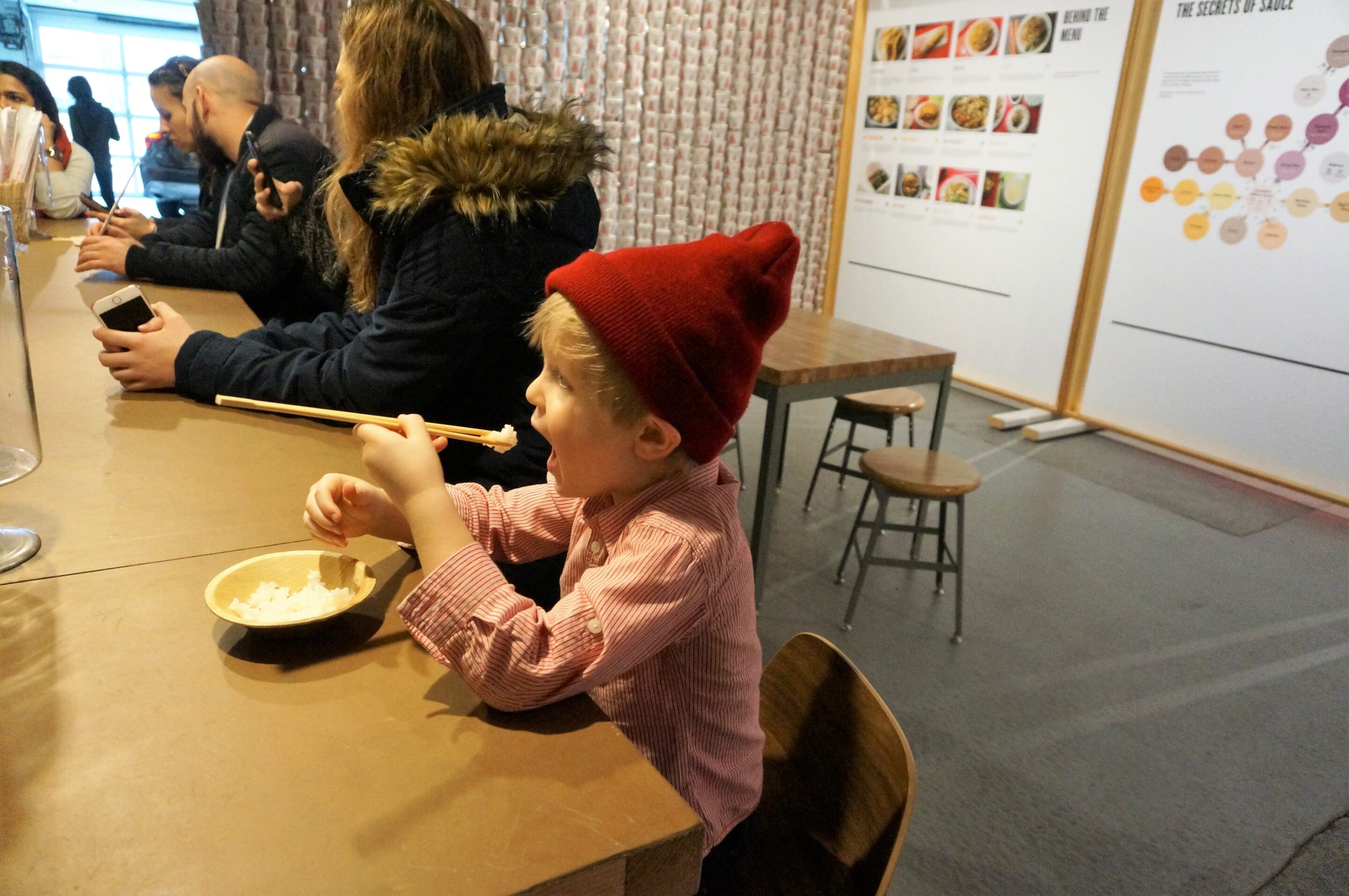 Eating yummy noodles at the CHOW Exhibit 