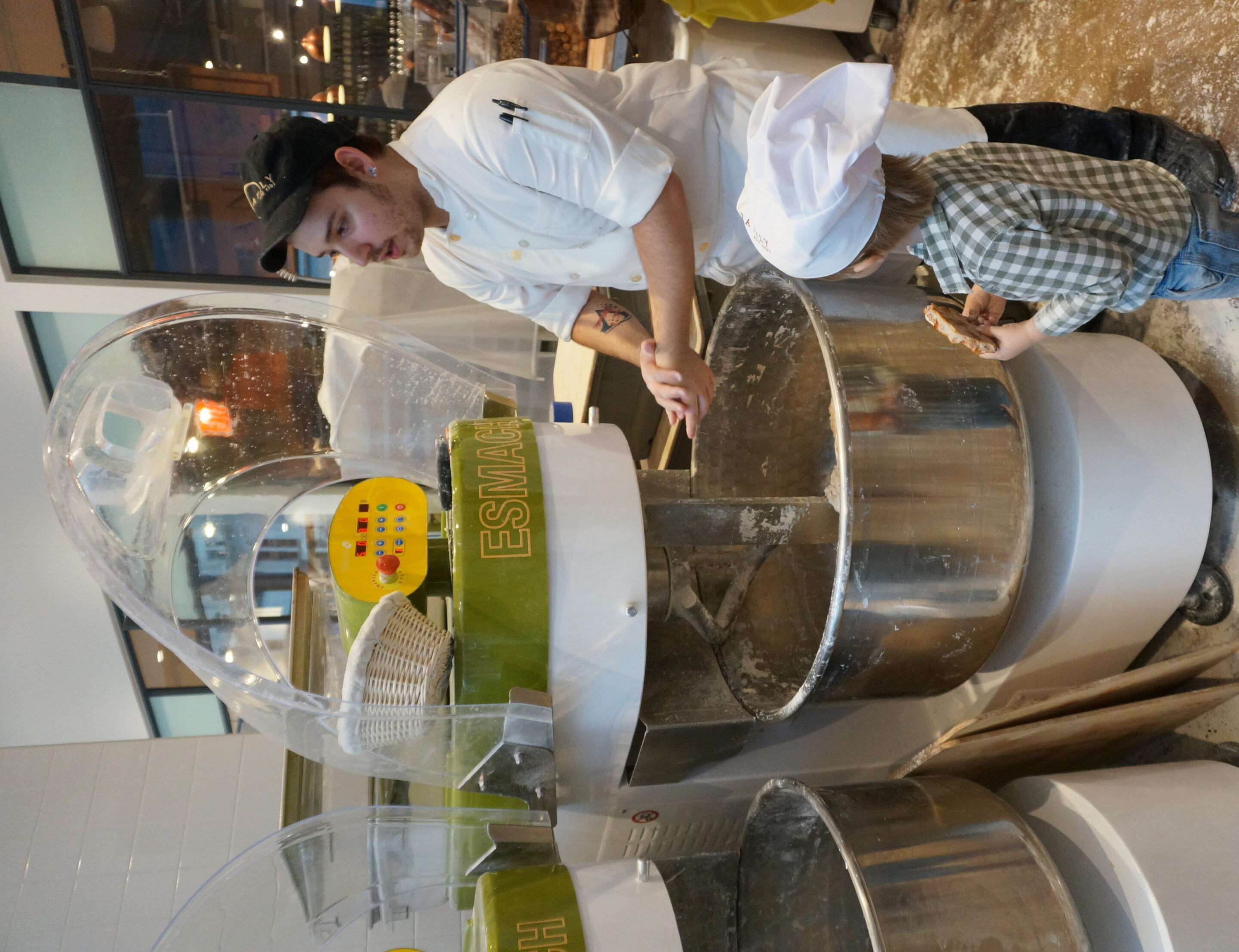 Helping mix the ingredients at Eataly Downtown
