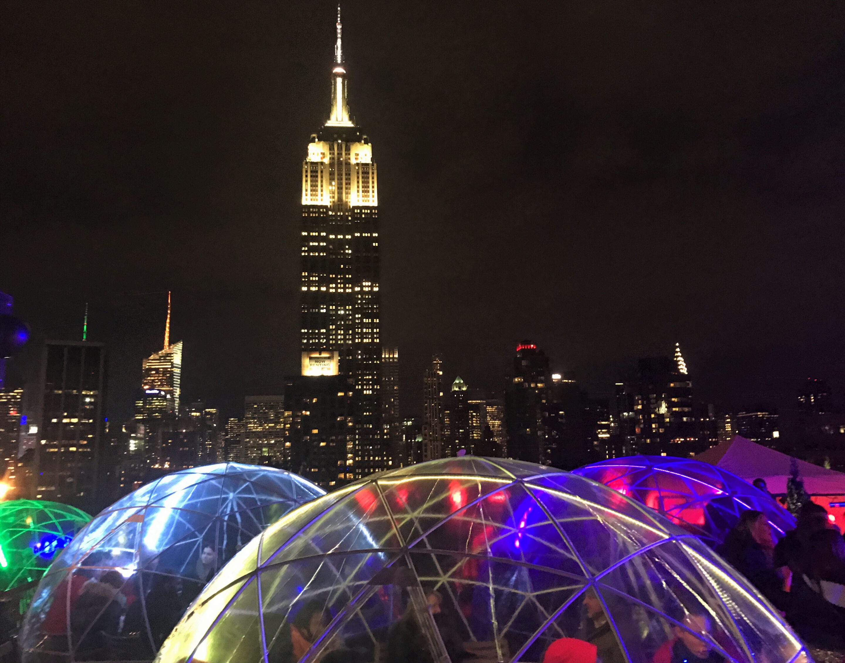 Night scene with Igloos at 230 Fifth Rooftop in NYC