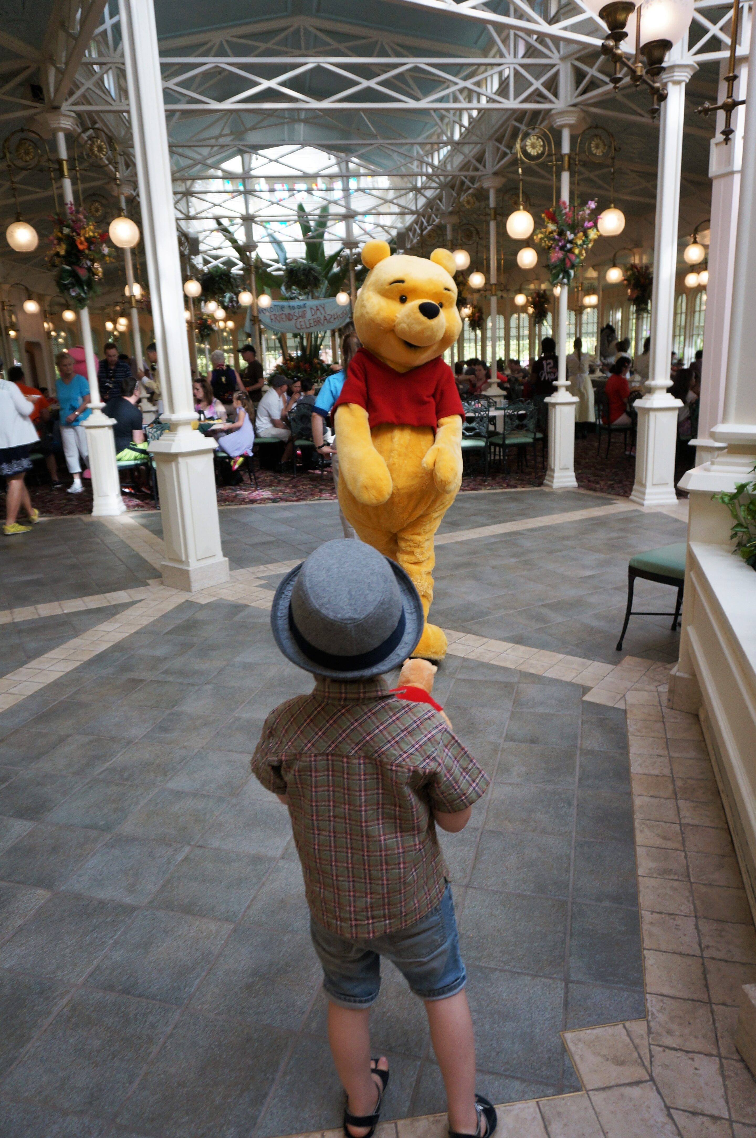 Saying hi to Winnie the Pooh at the Character Breakfast in the Crystal Palace