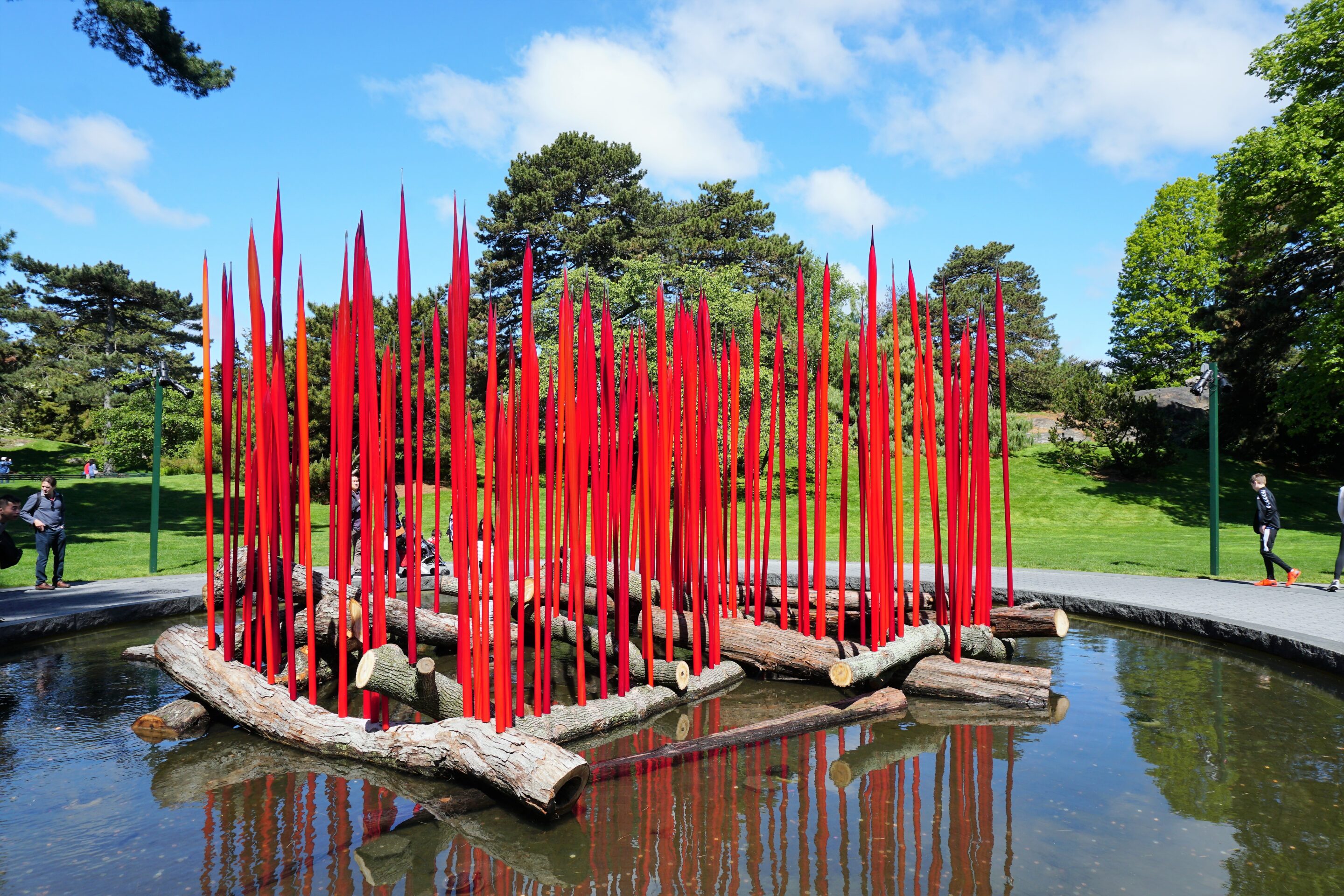 Chihuly: Red Reeds on Logs