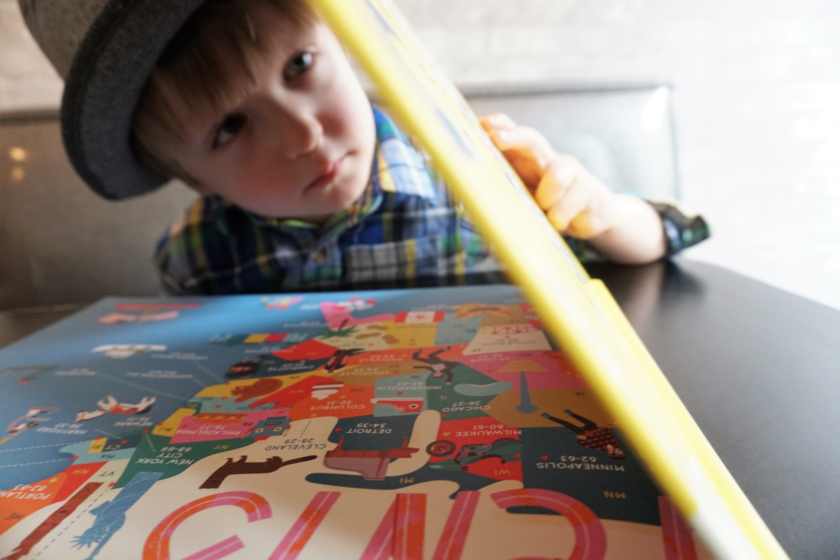 Taking a look inside of 50 Cities of the USA Travel Book